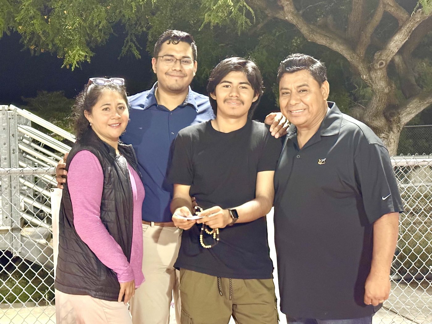 Karime with her husband Eduardo and their sons, Lalo and Brian
